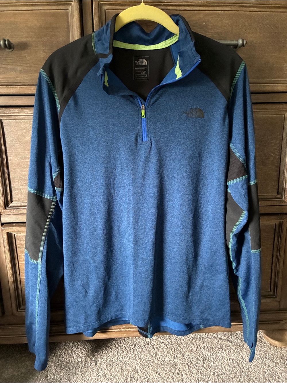 The North Face Blue and Black Half-Zip Pullover with Lime Accents